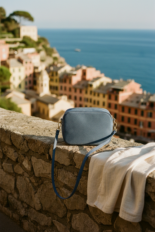 Blue crossbody bag on a white background